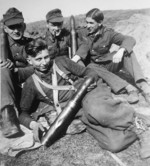 German Panzerjäger crew posing with captured Soviet anti-tank shells, date unknown