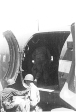 Personnel of US 5332nd Brigade (Provisional) boarding a C-47 aircraft, Lashio Airfield, Shan, Burma, Apr 1945