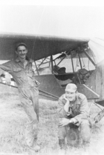 George Sodemann and Bev Cole of US 5332nd Brigade (Provisional) with L-4 liaison aircraft at Muse, Shan, Burma, Apr 1945
