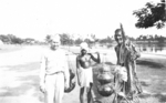 Member of US Army Medical Detachment 1340 with civilians, Fiji, 1942-1944