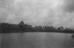 Village along a river, Fiji, 1942-1944, photo 1 of 2