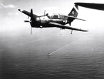 Curtiss SB2C-3 Helldiver with Bombing Squadron VB-80 returning to the USS Hancock after flying close ground support strikes in support of the Marines landing on Iwo Jima, 19 Feb 1945.