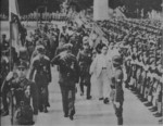 Wang Jingwei inspecting Chinese collaborationist troops, Guangzhou, Guangdong Province, China, 15 Jun 1942; note group of Japanese officers in background
