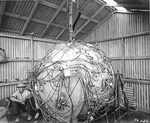 “The Gadget” atomic device on 15 Jul 1945 as it being readied for the Trinity Test the following day, Alamogordo, New Mexico, United States.