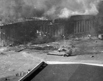 Seaplane hanger ablaze after being bombed by Japanese aircraft, Ford Island, Pearl Harbor, US Territory of Hawaii, 7 Dec 1941, photo 2 of 2