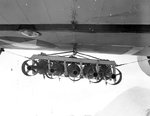 OS2U Kingfisher scout plane with five Mousetrap anti-submarine rockets mounted under one wing for testing purposes, Banana River, Florida, United States, 11 Dec 1942. Photo 3 of 4.