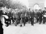 Charles de Gaulle and his entourage at the Arc de Triomphe, Paris, France, 26 Aug 1944