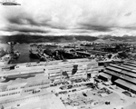 Ships at Pearl Harbor’s repair piers, 16 Jan 1944. Note the camouflage paint on the buildings.