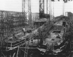 Ships Danzig and Theben under construction on Slip I of Nordseewerke shipyard, Emden, Germany, 1920 or 1921
