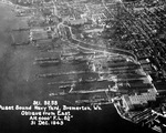 Aerial view of Puget Sound Naval Shipyard, 31 Dec 1943. Note the carrier USS Lexington (Essex-class) in drydock in the center of the photo.