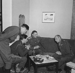 British Field Marshal Bernard Montgomery, right, and Soviet General Konstantin Rokossovsky, center, talk through their translators during a visit to Rokossovsky’s headquarters in Wismar, Germany, 7 May 1945.