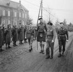 Field Marshal Bernard Montgomery and Major General Colin Muir Barber inspecting the 15th Scottish Division, 12 Dec 1944. At 6-feet, 9-inches, Barber was considered the tallest officer in the British Army.