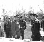 Chief of the Imperial General Staff Field Marshal Alan Brooke, Field Marshal Bernard Montgomery, and Supreme Allied Commander Dwight Eisenhower during an outdoor lunch break, 25 Mar 1945.