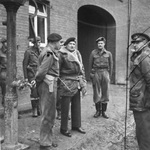 Field Marshal Bernard Montgomery making his first visit onto German soil in the village of Hillensberg, 3 Dec 1944. Note the censor’s cropping marks on the photograph.