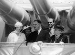 President Franklin Roosevelt (center) under USS Indianapolis’ 8-inch guns during the Navy Review, 31 May 1934, New York City, New York, United States. The president’s wife, Eleanor, is at left and mother, Sara, at right.