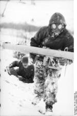 German Panzerschreck crew with gas masks, Soviet Union, Mar 1944, photo 4 of 4