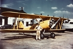 N3N-3 aircraft (Bureau Number 2885) in front of building 57, Naval Air Station Anacostia, Washington DC, United States, 1940; note JRF-4 Goose (Bureau Number 3852) in background