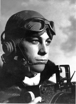 United States Navy Photographers Mate Don Garber in his flying helmet ready for an aerial photography flight from USS Saratoga, circa 1943.