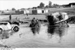 Raupenschlepper Ost tractor towing a 5 cm PaK 38 gun through water, Russia, Jun-Jul 1944