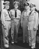 Rear Admiral David Bagley, Commander Hawaiian Sea Frontier; Admiral Chester Nimitz; Army Major General Delos Emmons, Military Governor of Hawaii; and Rear Admiral Aubrey Fitch aboard USS Saratoga, 16 Jun 1942.