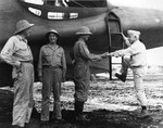 Vice Admiral Aubrey Fitch, right, boards a PBY-5A on Guadalcanal, Solomon Islands, after an inspection visit, May 1943. The others are USMC BGen Francis Mulcahy, USN RAdm Charles Mason, and Army MGen Alexander Patch.