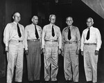 At Nimitz’ headquarters in Pearl Harbor are VAdm William Calhoun, VAdm John Towers, Adm Chester Nimitz, VAdm Robert Ghormley, and VAdm Aubrey Fitch, 14 Nov 1943. All but Nimitz were classmates at the Naval Academy.