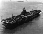 USS Ticonderoga off Hampton Roads, Virginia, United States, 26 Jun 1944. Two months later, the flight deck would be extended 11-feet to nearly cover the forward 40mm anti-aircraft mounts.