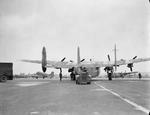 Avro York of No. 511 Squadron RAF being towed to its dispersal at RAF Lyneham, Wiltshire, England, United Kingdom, 1944-1945. Note additional York in the background on the right and a Dakota on the left.