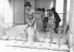 Civilians packing sandbags, Hong Kong, 1941