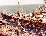 Battleship USS Iowa and carrier USS Shangri-La receiving fuel from oiler USS Cahaba, 8 Jul 1945. Photo 4 of 5.