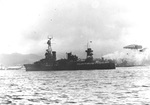 Cruiser USS Northampton arriving at Pearl Harbor, Hawaii the day after the attack, 8 Dec 1941. Note her false bow wave camouflage. Photo 2 of 2.