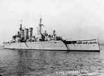 Cruiser HMS Cumberland in 1954 in her final role as a trials platform for many different types of weapons systems as well as smaller pieces of equipment prior to their introduction into the Fleet. Location unknown.