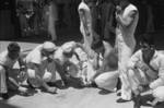 US Navy personnel of USS Augusta looking at deck damage caused by an errant Chinese anti-aircraft shell, Shanghai, China, 21 Aug 1937, photo 4 of 6