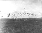 Destroyer USS Helm repelling a special attack from a Nakajima Ki-43 