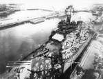 USS Tennessee at Pier 6 at the Puget Sound Naval Shipyard, Bremerton, Washington, United States, 19 Feb 1942. The photo was taken from the Hammerhead crane at the end of the pier (shadow).