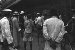 People gathering outside Sincere department store, damaged by Japanese bombing, Shanghai, China, 23 Aug 1937, photo 1 of 4