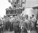 Japanese liaison party aboard destroyer USS Cummings as part of the occupation process at Higashi Harbor, Haha Jima, Bonin Islands, 14 Sep 1945.