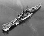 Cruiser USS Pasadena in Dazzle paint scheme Measure 32, Design 24D leaving Boston Harbor, Massachusetts, United States 21 Jul 1944. Photo from a blimp with Airship Patrol Squadron ZP-11. Photo 3 of 3.