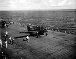 Grumman F6F-5 Hellcat “10,000th Hellcat” BuNo 78854 of Fighting-Bombing Squadron VBF-87 preparing for launch from USS Ticonderoga, May-Jun 1945 in the western Pacific.
