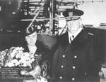 Growler sponsor Mrs. Lucile L. Ghormley, wife of Vice-Admiral Robert L. Ghormley, and Rear Admiral Charles A. Dunn at the christening and launching of the submarine Growler, Groton, Connecticut, 22 Nov 1941.