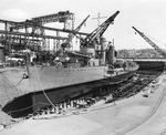 Destroyer USS Shaw ready to be undocked from Drydock No. 1 at Mare Island Naval Shipyard, Vallejo, California, United States after being fitted with a new bow section, 3 May 1942.
