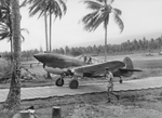 RAAF Squadron Leader Keith W “Bluey” Truscott taxiing his P-40E Kittyhawk along the Marston Mats at Milne Bay Fighter Strip #3, Milne Bay, New Guinea, Sep 1942.