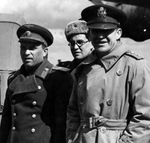 Soviet Major General S.K. Kovalev and US Major General John Deane with an interpreter at Poltava Air Base, Ukraine, 12 Apr 1945. MGen Deane was stationed in Moscow as the US military attaché to the Soviet Union.