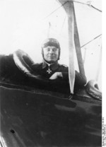 Ernst Udet in his aircraft, shortly after having landed on the Trient Glacier in the Mont Blanc Massif, Switzerland, 1920s