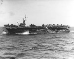 USS Attu, an escort carrier with a replenishment group, the morning after enduring Typhoon Connie in the Philippine Sea, 5 Jun 1945. Note at least three TBM Avengers tossed onto their backs by the storm.