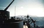 View from the battleship USS New York with USS Arkansas and cruisers USS Brooklyn and Nashville behind as they leave Reykjavik, Iceland after escorting the US Marine landing force there, 12 Jul 1941.
