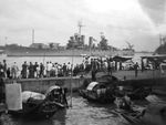 Cruiser USS Nashville anchored in the Huangpu River, Shanghai, China, Oct 1945 as flagship for the Yangtze River patrols. Photo 1 of 2.