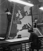 WAAF officer plotting the course of an aircraft while two WAAF special duties clerks altered the position of a convoy in the Operations Room at Coastal Command Headquarters at Eastbury Park, Northwood, Middlesex, England, United Kingdom, date unknown