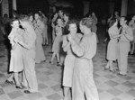 WAAF Leading Aircraftwomen Jackie Bergen and Fredda Tinsley, with other RAF and WAAF personnel, dancing at the Lady Rosalinde Tedder Club in Cairo, Egypt, 1944-1945