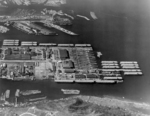 Todd-Pacific Shipyard, Tacoma, Washington, United States in 1942-43. 21 of the 37 Bogue-class escort carriers built at Todd-Pacific are seen in this photo and 5 more are just out of frame to the left.